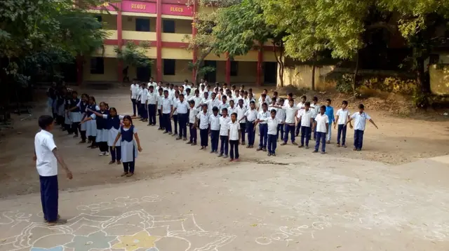 Students lined up in the school courtyard